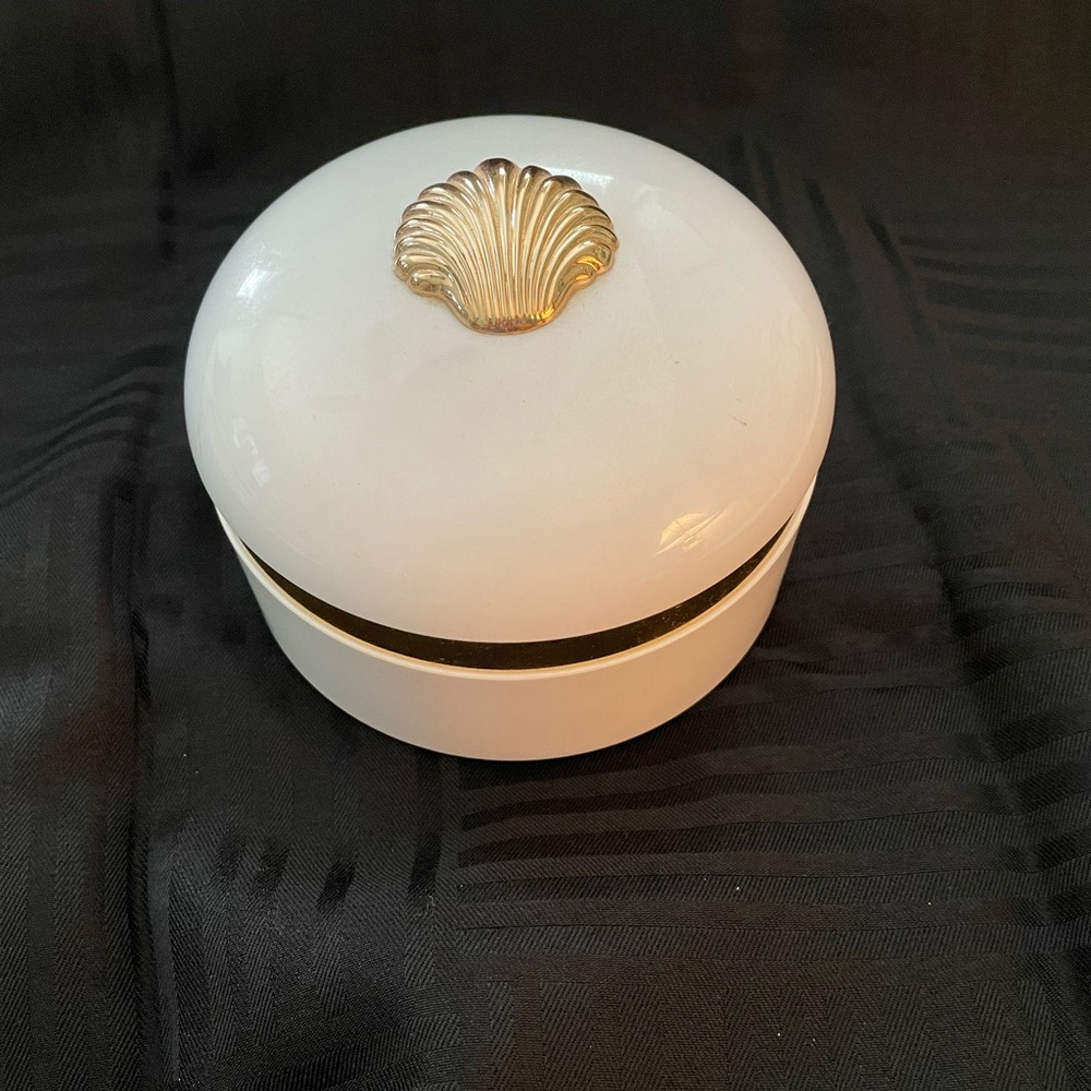 Vintage empty 1980’s Estée Lauder White Linen perfume body powder container.